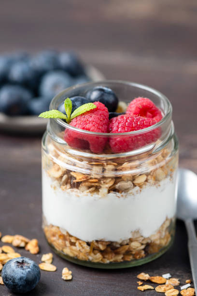 istock Greek yogurt with granola and berries 2186210784
