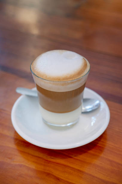 hot cappuccino with foam on a table in a cafe 1