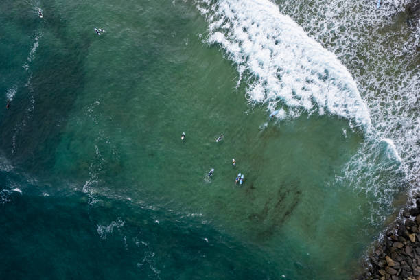 istock Surfers in the Atlantic Ocean drone photo 2186223062