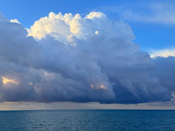 istock Cumulonimbus clouds above ocean. 2186235959