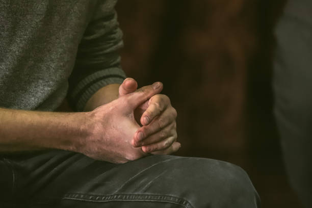 Nonverbal Gestures. Closed Pose. Holding in Hands. Real Life. Gestures to convey emotions. Psychology of Communication. Hands close up.
