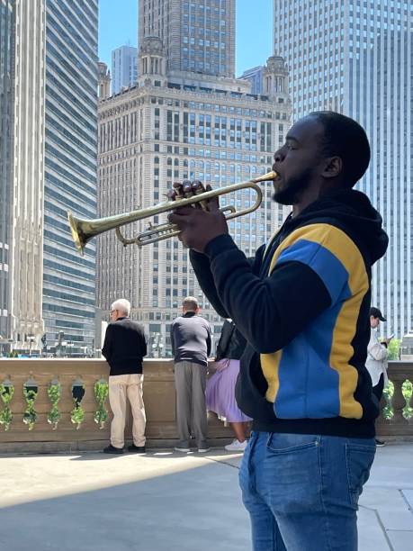 Street Musician Plays Jazz Trumpet in Downtown Chicago