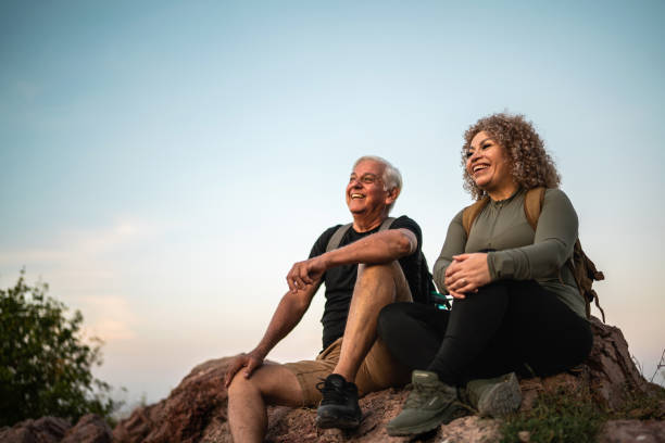 istock Senior couple admiring the view during hiking 2186251049
