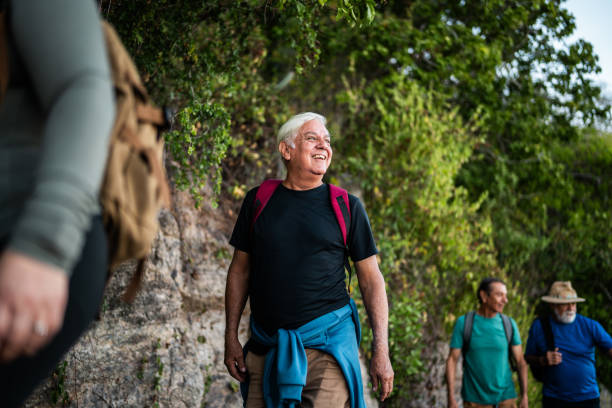 istock Senior man walking and enjoying the view during hiking 2186251198