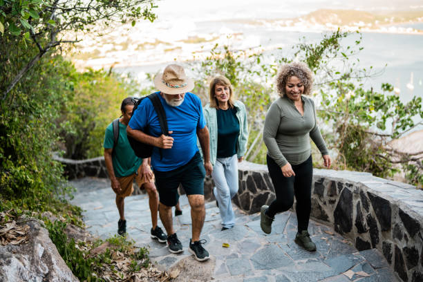 Senior man with friends during hiking