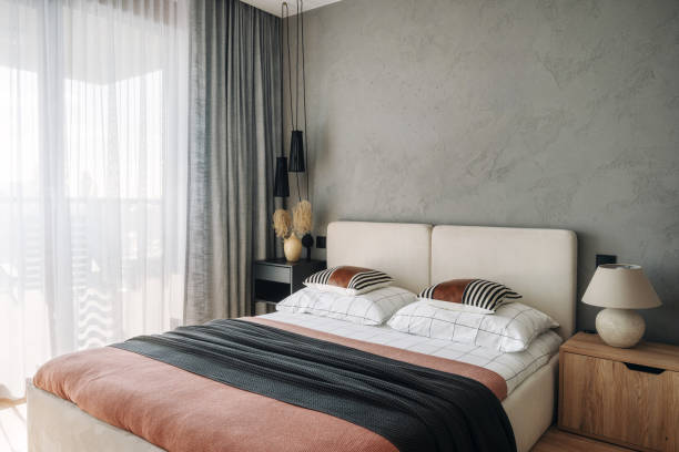 istock Modern bedroom with natural light and minimalist decor in a contemporary setting 2186251743