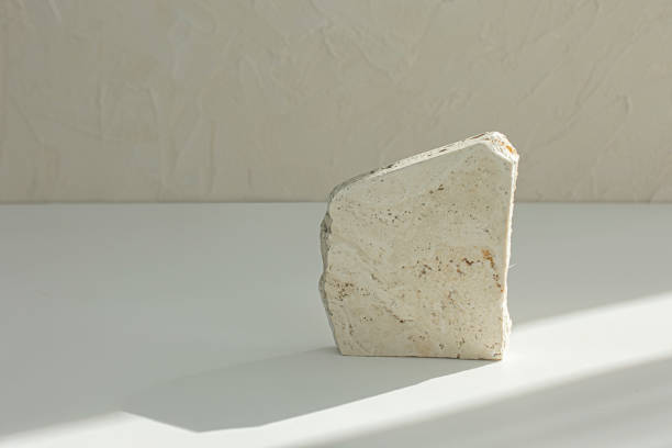 istock Concrete stone podium against shadow composition for product presentation. 2186257027
