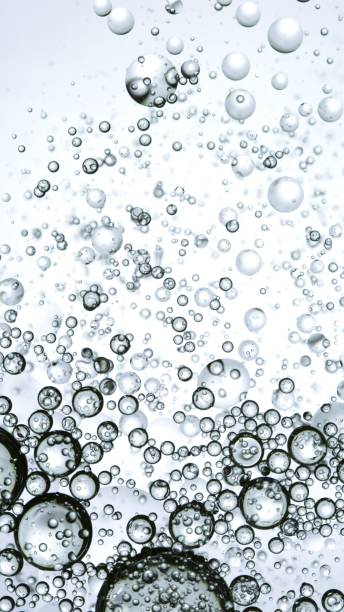 istock Macro Shot of Moving Oil Bubbles on Light Background 2186265206