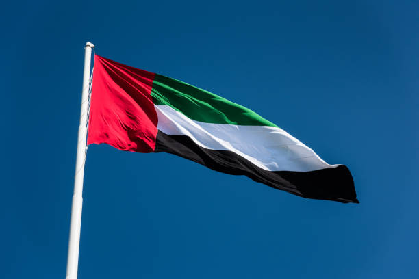 istock uae flag on the blue sky 2186265716