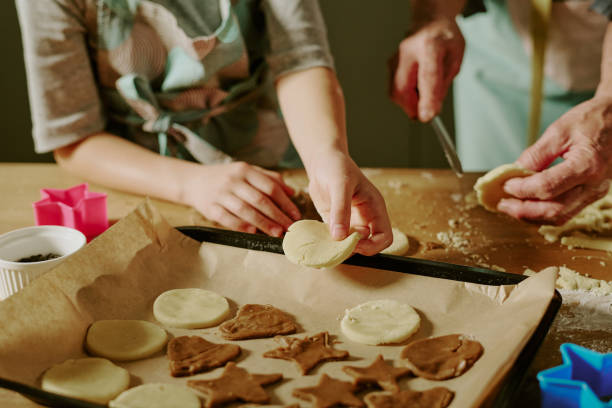 istock Baking Cookies with Child Making Star and Round Shapes 2186273269
