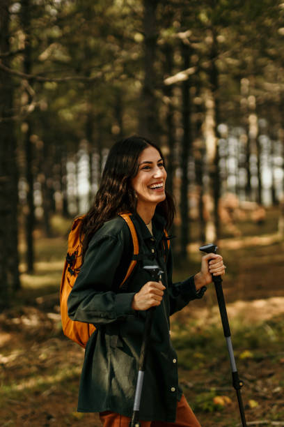 istock Walking alone through the sunny woodland 2186277976