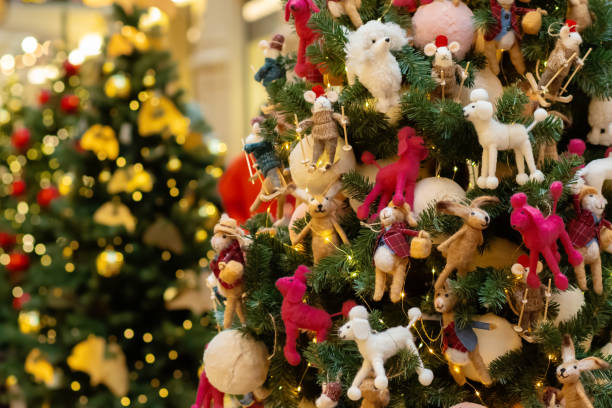 istock Holiday celebration, Christmas tree, festive garland, shining ornaments 2186281664