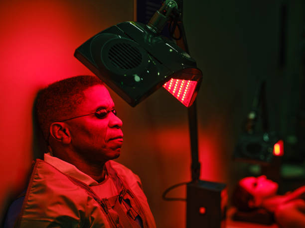 istock Man On an LED Bed Receiving Red Light Therapy 2186284833