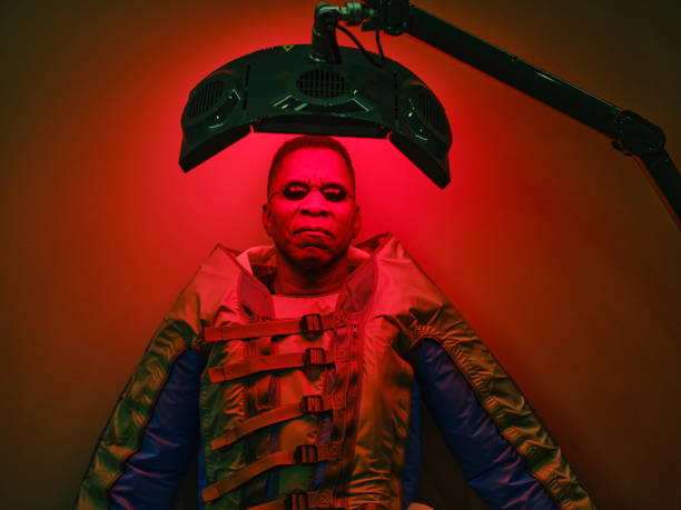 istock Man On an LED Bed Receiving Red Light Therapy 2186284867