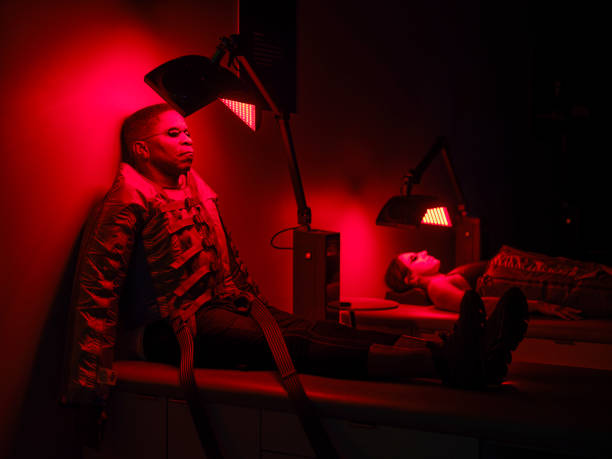 istock Man On an LED Bed Receiving Red Light Therapy 2186284895