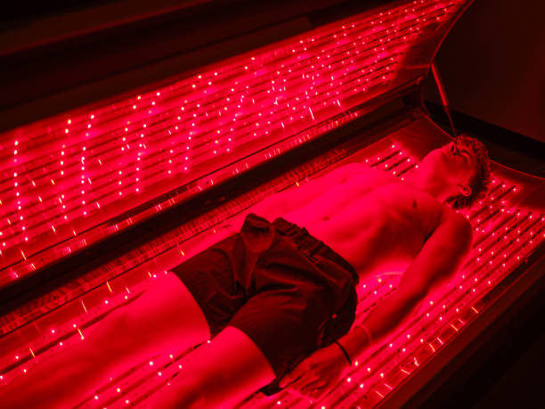 istock Young Man On an LED Bed Receiving Red Light Therapy 2186285352