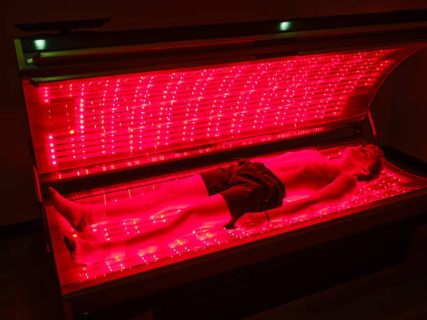 istock Young Man On an LED Bed Receiving Red Light Therapy 2186285370