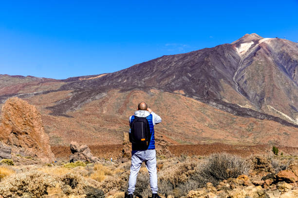 istock Traveling man in a natural environment 2186286770