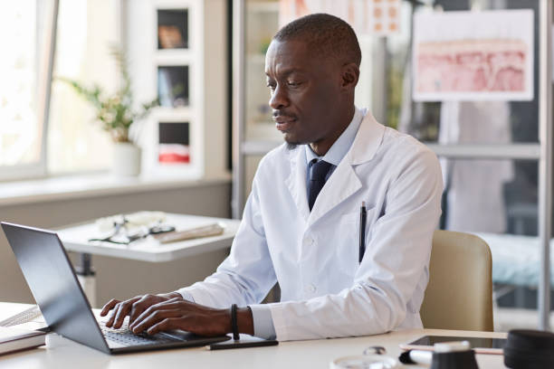 istock Black Man Working as Doctor in Clinic 2186297624