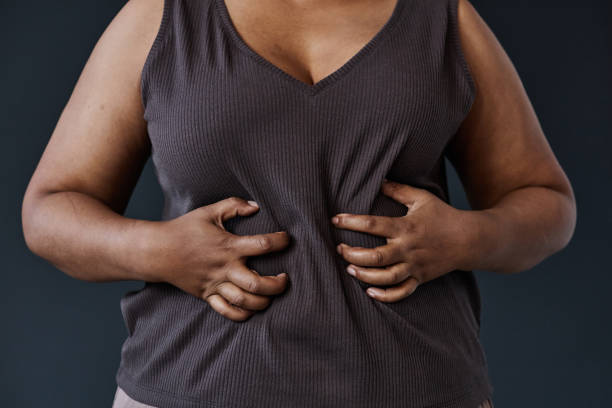 istock Overweight Black Woman with Insecurities 2186297822