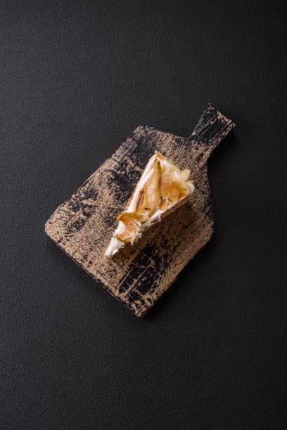 istock Layered sweet cake with cream, pear and dorblu cheese 2186303564