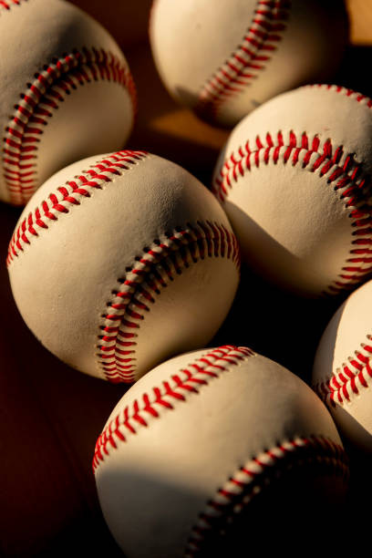 istock sport ball baseball ball pile in sunlight 2186306108