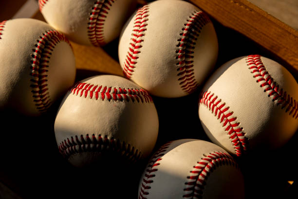 istock sport ball baseball ball pile in sunlight 2186306112
