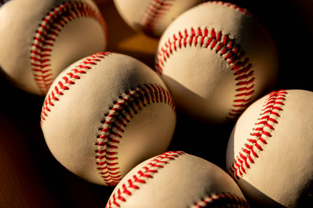 istock sport ball baseball ball pile in sunlight 2186306146