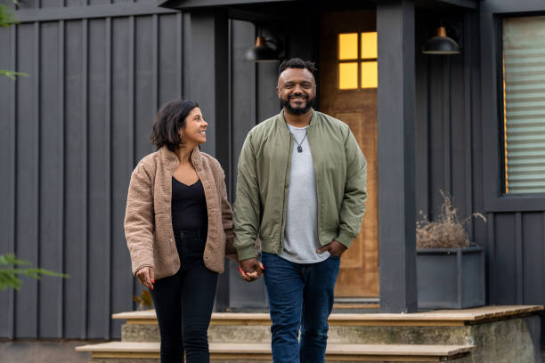 istock couple in front of the new house 2186306580