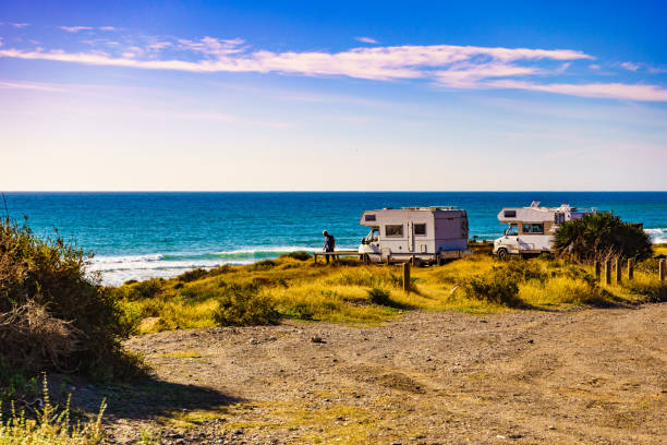 istock Tourist traveling by camper, camp on seashore, Spain 2186307529
