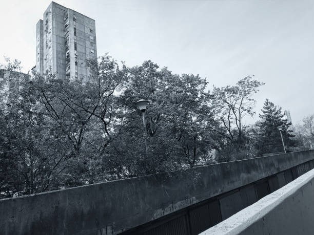 View to concrete building from the gate of another concrete building