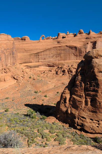 istock Arches NP - Delicate Arch and Canyon Below 2186322069