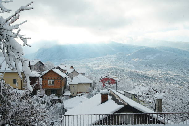 istock First snow in Sarajevo  and houses on mountainside 2186324417