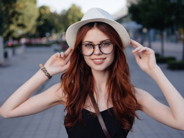 istock beautiful woman in a hat outdoors summer Lifestyle 2186325350