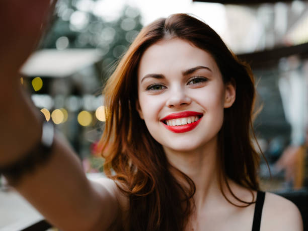 istock pretty woman in a summer cafe vacation summer communication 2186325747