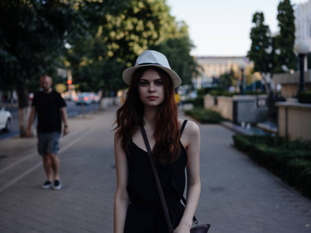 beautiful woman in a hat outdoors summer Lifestyle. High quality photo