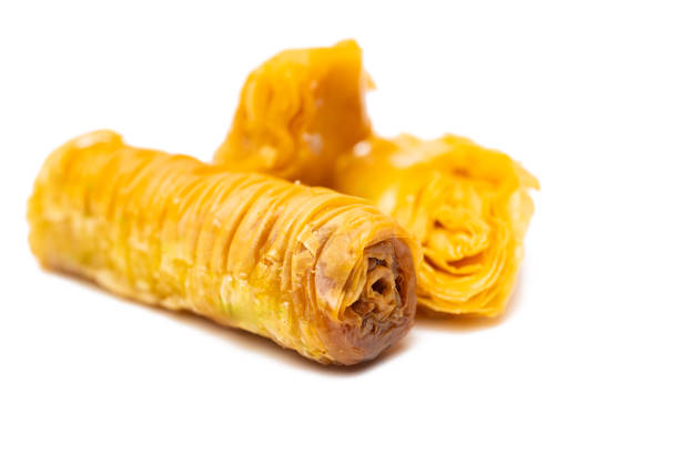 Delicious sweet baklava with walnuts isolated on white background. Top view.