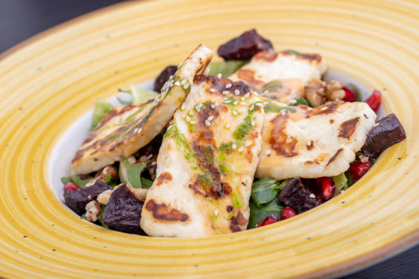 istock tasty greek cheese with fresh greens salad 2186330751