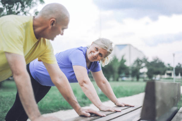 istock Senior Couple Exercising Outdoors 2186332198