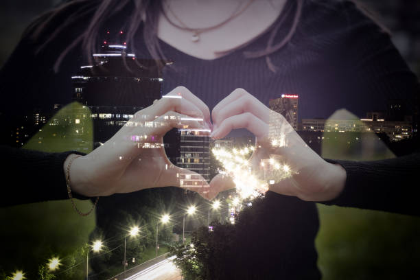 City in the heart. Love and city life through double exposure effect.