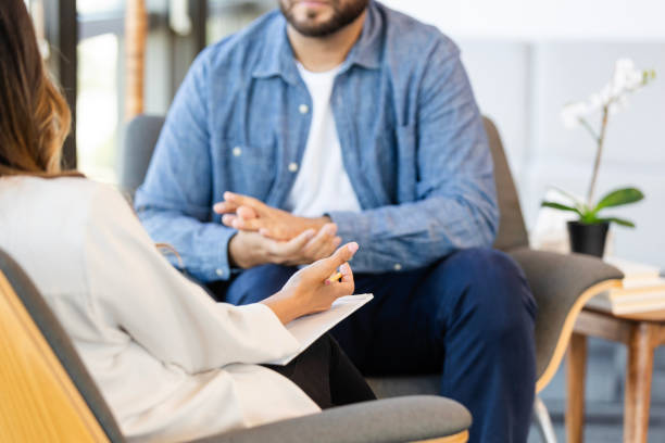 istock Therapist gives advice to unrecognizable man 2186332833