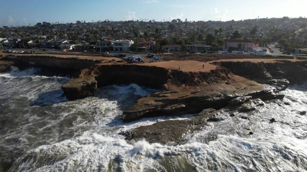 istock Aerial view of rugged coastline with crashing waves. 2186335768