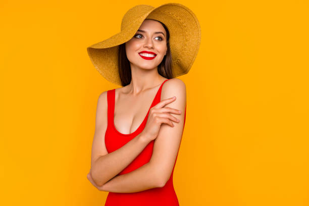 istock Photo of charming cheerful lady hand touch shoulder look interested empty space isolated on yellow color background 2186340181