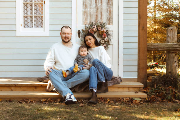 istock Family Together Outside on a Rustic Porch. 2186341426