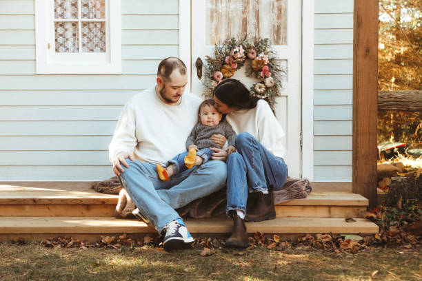 istock Family Together Outside on a Rustic Porch. 2186342846