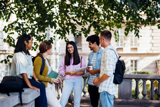 istock Diverse Group of Students Engaging in Outdoor Study Session 2186344187