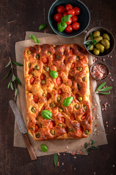 istock Traditional focaccia baked in a rectangular baking tray. 2186345084