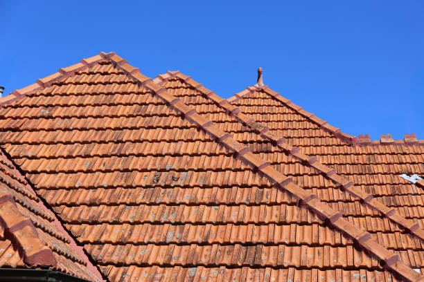 istock Orange Terracotta tiled rooftop against Blue sky. 2186362526