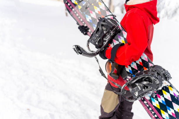 istock Asian woman practice snowboarding at ski area. 2186369344