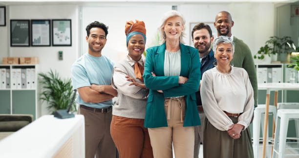 istock Designers, portrait and confident in office with collaboration, ambition or teamwork. Creative people, project management or diversity in agency for small business growth, startup pride or about us 2186384041